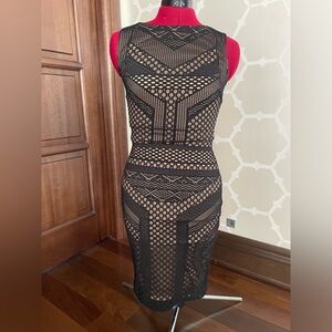 Gold lined - black eyelit dress